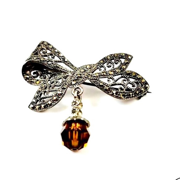 Vintage .925 Marcasite Bow Brooch Pin Dangling Amber Color Glass Stone